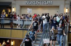 Protesters Storm St. Louis Mall Chanting "No Justice, No Profits" As U2 Cancels Concert Protesters Storm St. Louis Mall Chanting "No Justice, No Profits" As U2 Cancels Concert