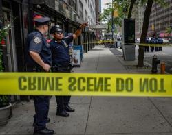 Three Stabbed In Fight Outside Midtown Manhattan School, Suspect At Large
