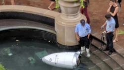 Robot Security Guard "Commits Suicide" In Mall Fountain Robot Security Guard "Commits Suicide" In Mall Fountain