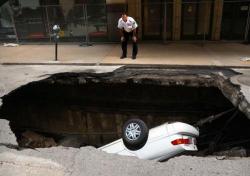 "We Don't Know What Happened" St. Louis Officials Clueless As Downtown Sinkhole Swallows Car