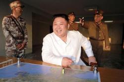 A Giddy Kim Jong-Un Vows To Send "Bigger Gift Package" To America
