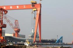 China Launches First Domestically-Built Aircraft Carrier