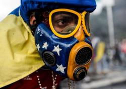 Dramatic Images From 3 Months Of Deadly Anti-Government Protests In Venezuela