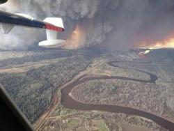 "Out Of Control" Canada Wildfire Could Double In Size Today: Fort McKay Evacuated