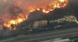 "Like Driving Into Hell" - Los Angeles' 405 Freeway Shutdown As Wildfires Spread