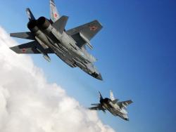 Russian Fighter Jet Flies Within 50 Feet Of US Spy Plane Over Russian Naval Base