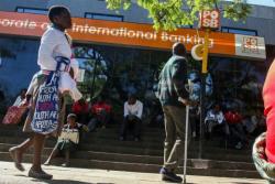 Zimbabwe To Print Its Own US Dollars Amid Severe Cash Shortage Zimbabwe To Print Its Own US Dollars Amid Severe Cash Shortage